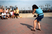 Photographer Maria Savidis-Markatos photographing tourists at Liberty State Park , Jersey City, NJ 2001 - Photo by Chrisopi Schmitt